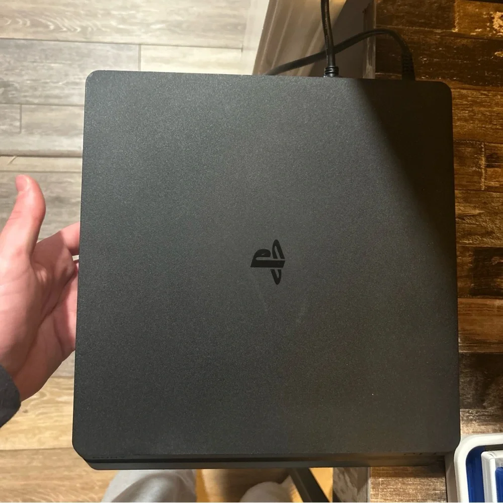PS4 console with 3 controllers. Great condition!